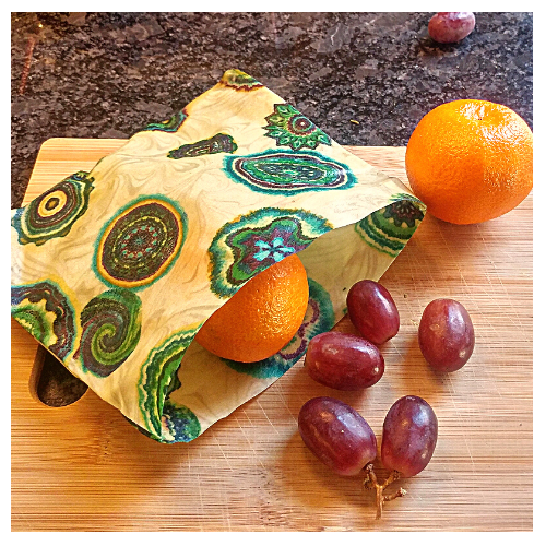 Beeswax Wrap Beeswax Pouch by Beezy Wrap. A Biodegradable environmentally friendly beeswax wrap made in Nova Scotia, Canada. A replacement for plastic. Keep food fresh longer. Bright colors and biodegradable packaging.